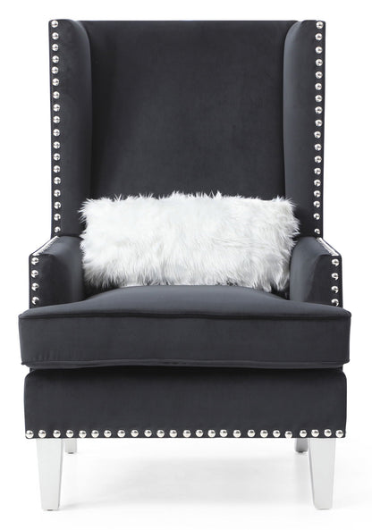 Accent arm chair in black with studded arms and white fur pillow on Tampa Home & Garden on Tampa Home & Garden Store