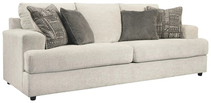 Soletren sleeper sofa beige textured fabric with four dark gray and patterned cushions on Tampa Home & Garden Store
