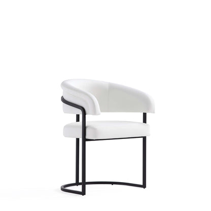 Geometric Base Dining Chair with white vegan upholstery, curved arms, circular black base on Tampa Home & Garden Store