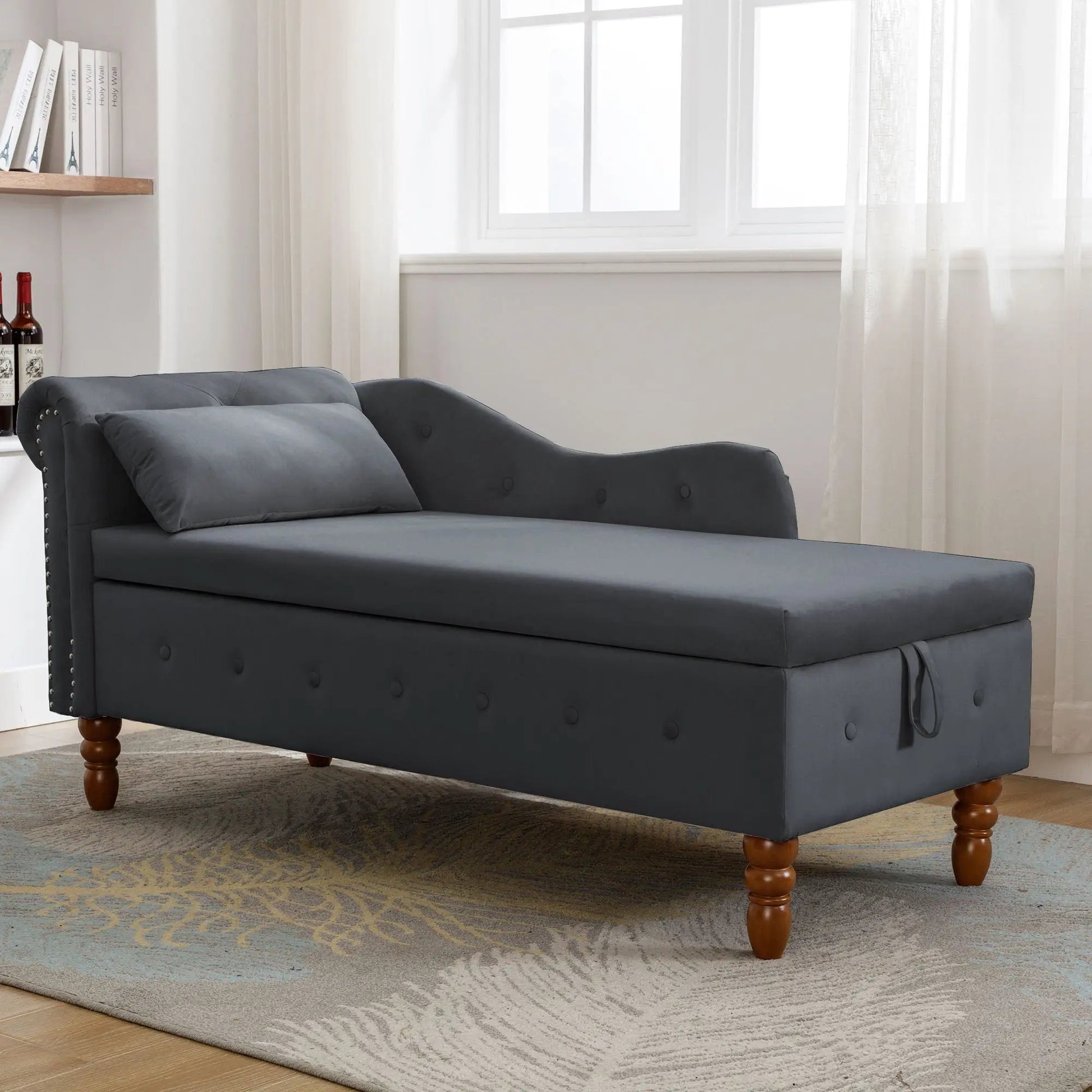 Chaise lounge in dark gray upholstery with rolled arms, nailhead trim and storage on wood legs on Tampa Home & Garden Store