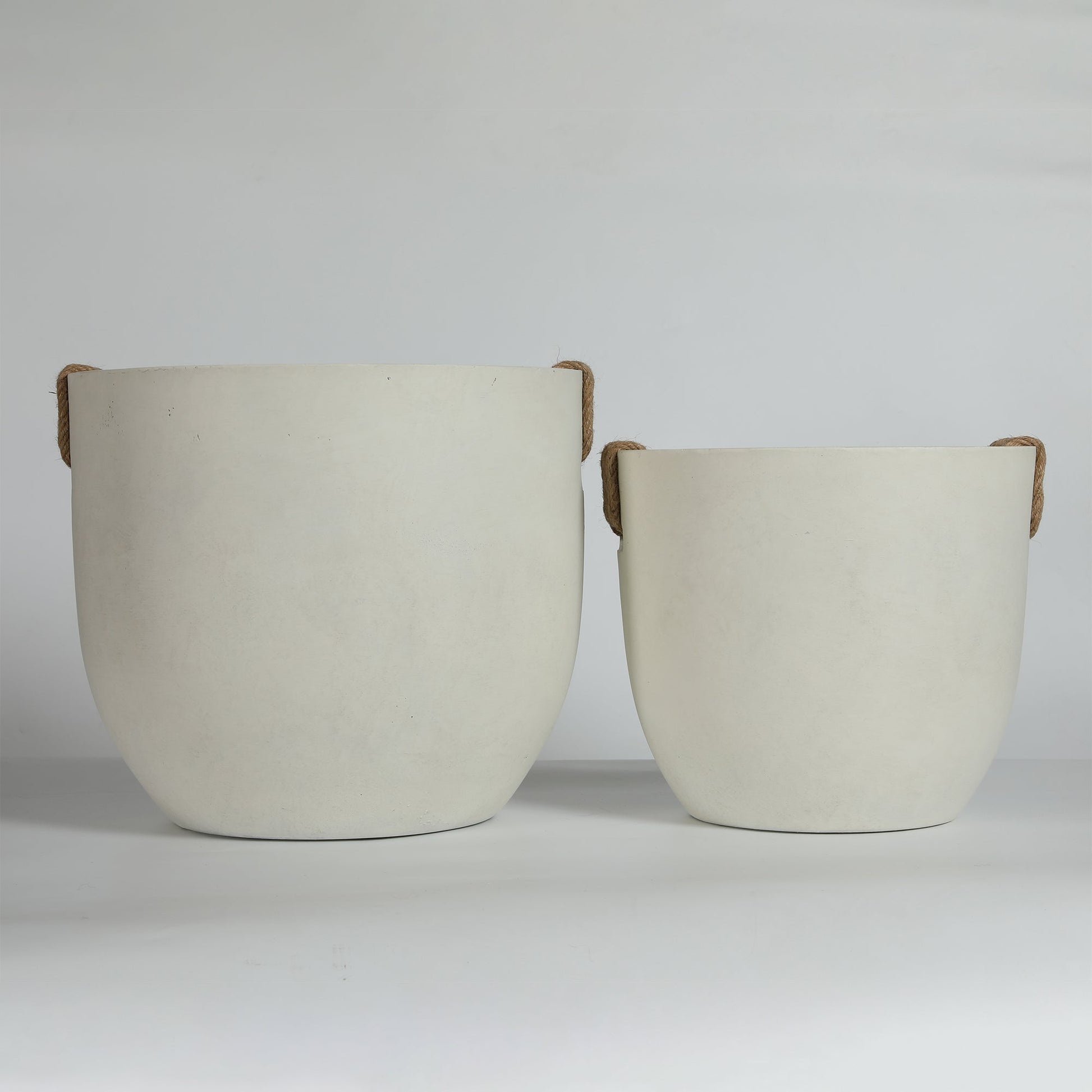 Round concrete planters set of 2 in off-white with rope handles, large handmade pots on Tampa Home & Garden Store