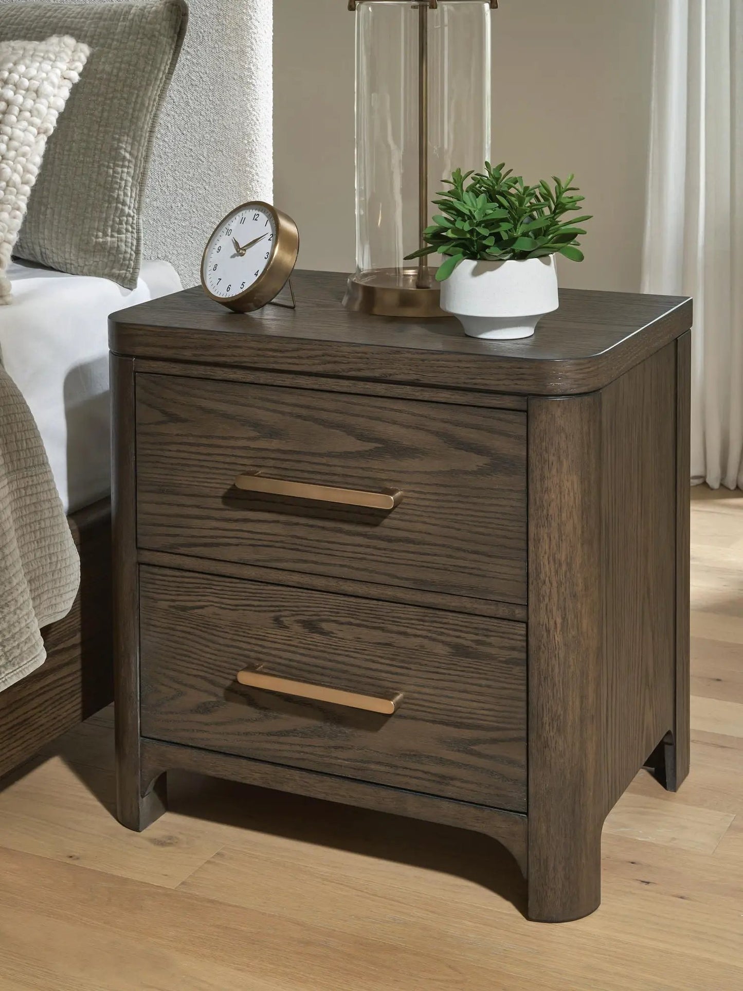 Radkin Two Drawer Night Stand Burnished Brown