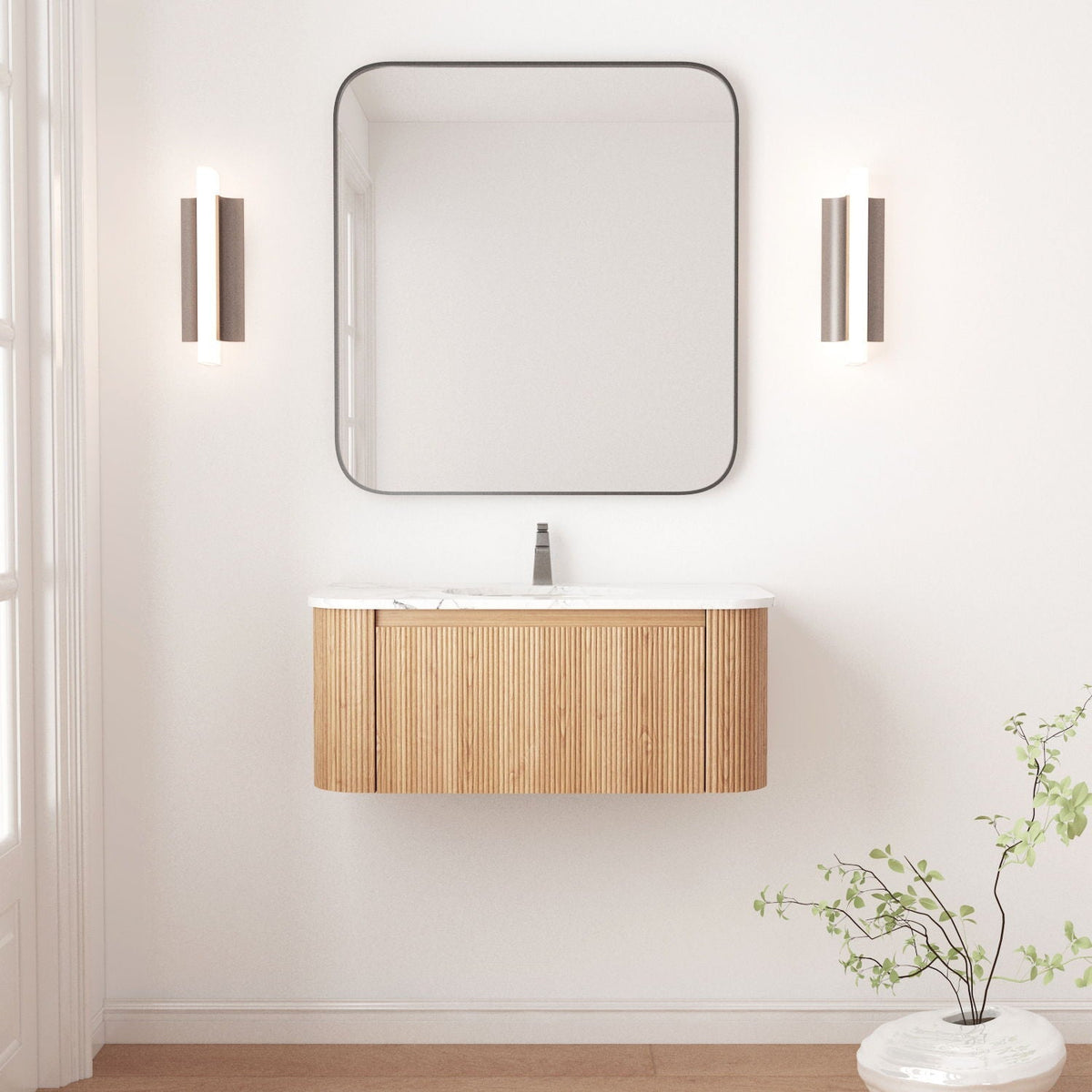 Wall mounted bathroom vanity with sink in natural wood, marble top and rounded mirror, sconces on Tampa Home & Garden Store