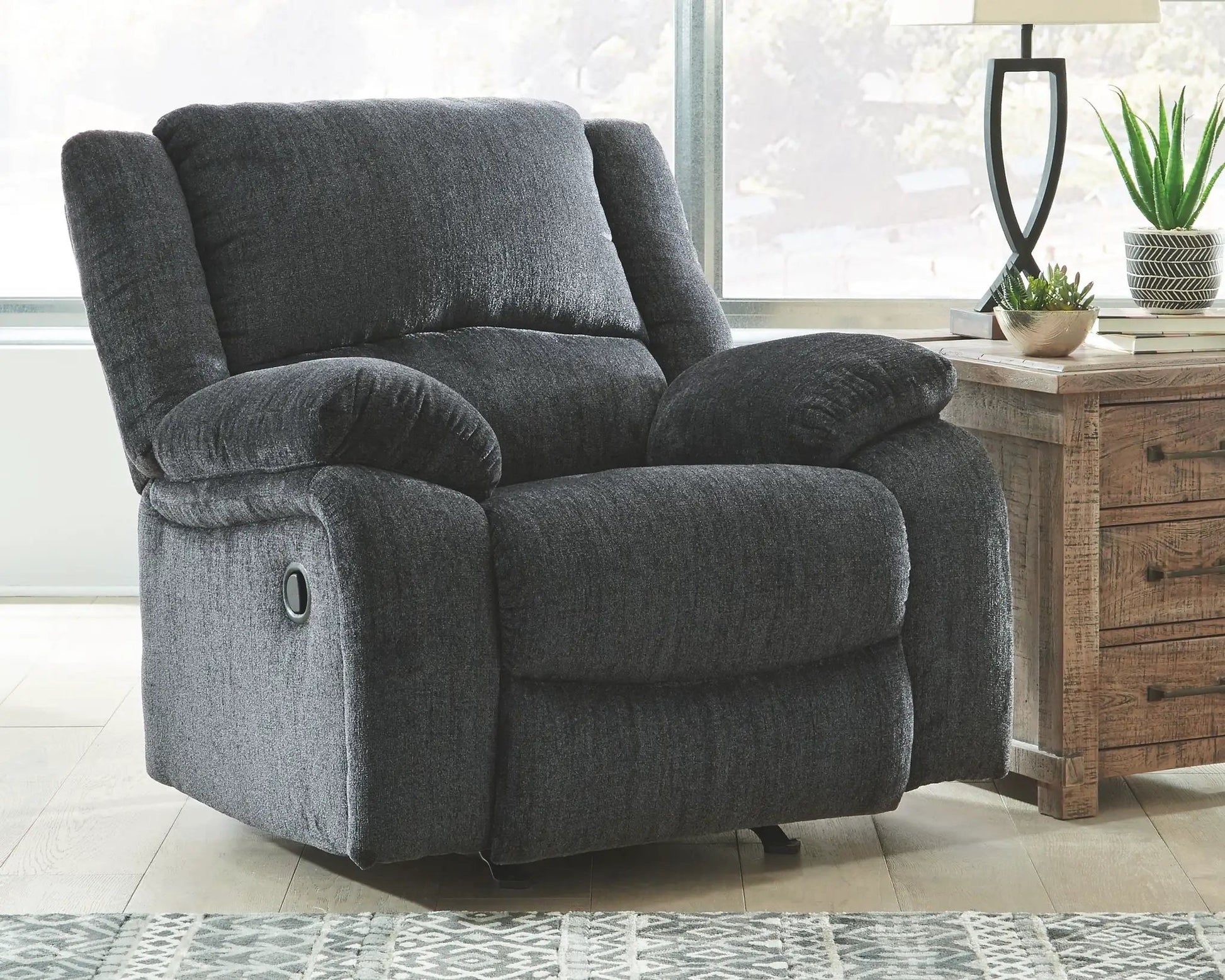 Draycoll rocker recliner in charcoal gray fabric with plush cushions by Unique Piece Furniture on Tampa Home & Garden Store