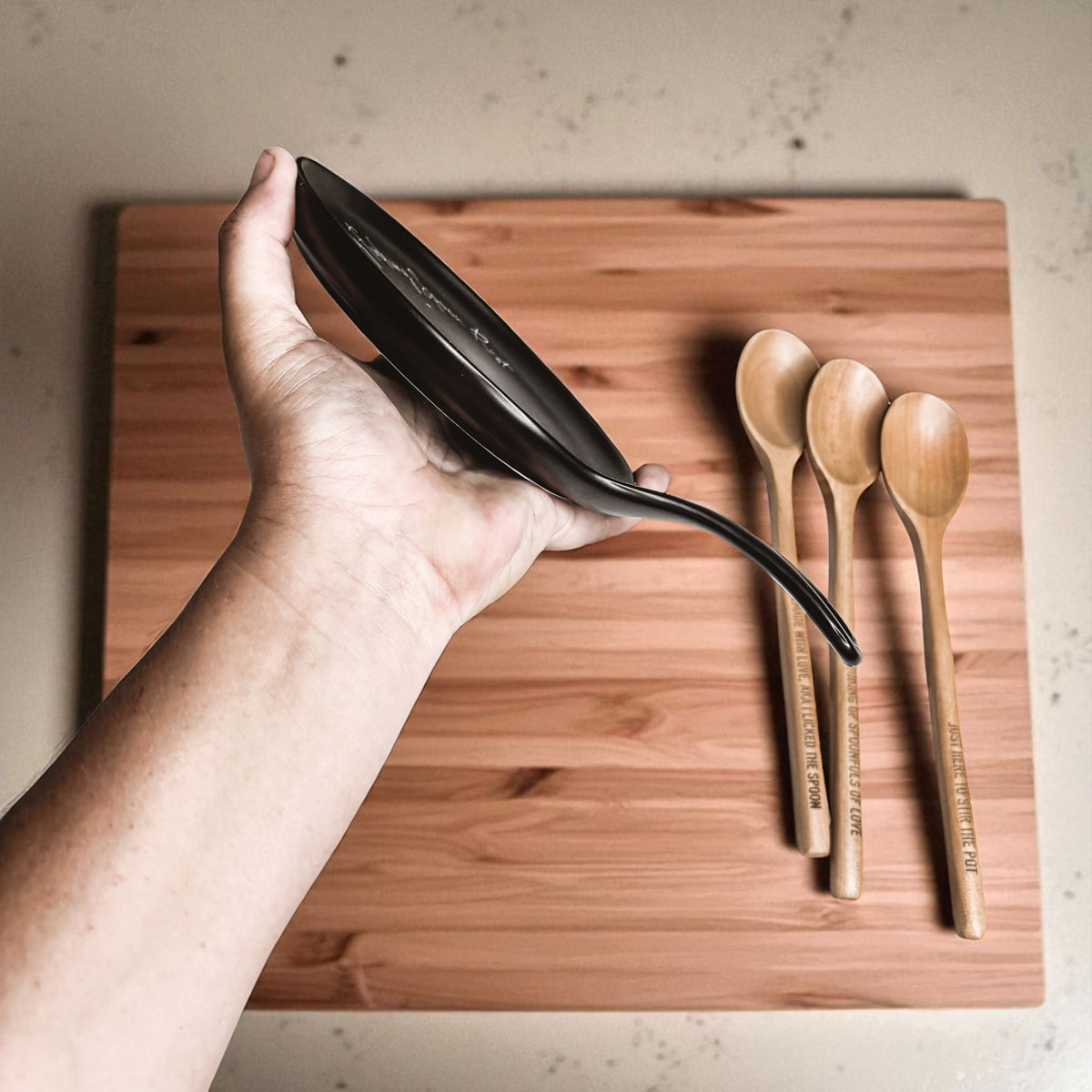 Chaos & Sauce Boss spoon rest in black by Gia Roma, kitchen accessory on Tampa Home & Garden Store