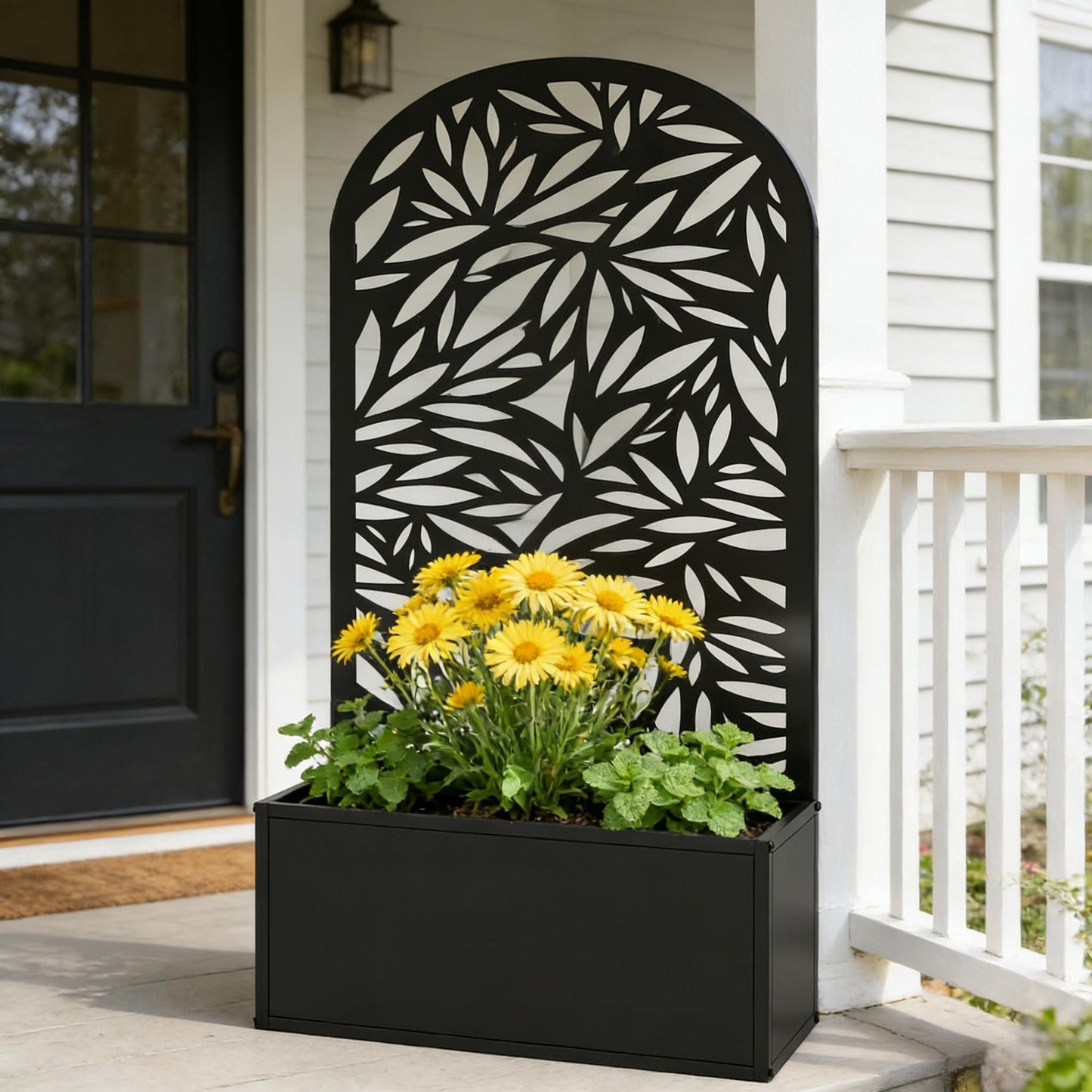 Curved raised garden bed by HouseOfZazla with black leaf-pattern metal panel planter box on Tampa Home & Garden Store