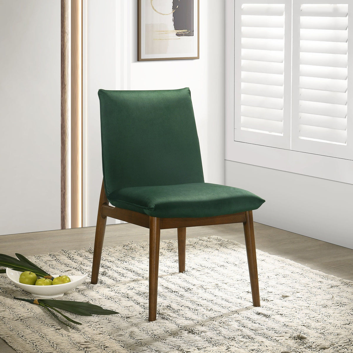 Monza contemporary dining chair with dark green upholstery and solid wood legs on Tampa Home & Garden Store
