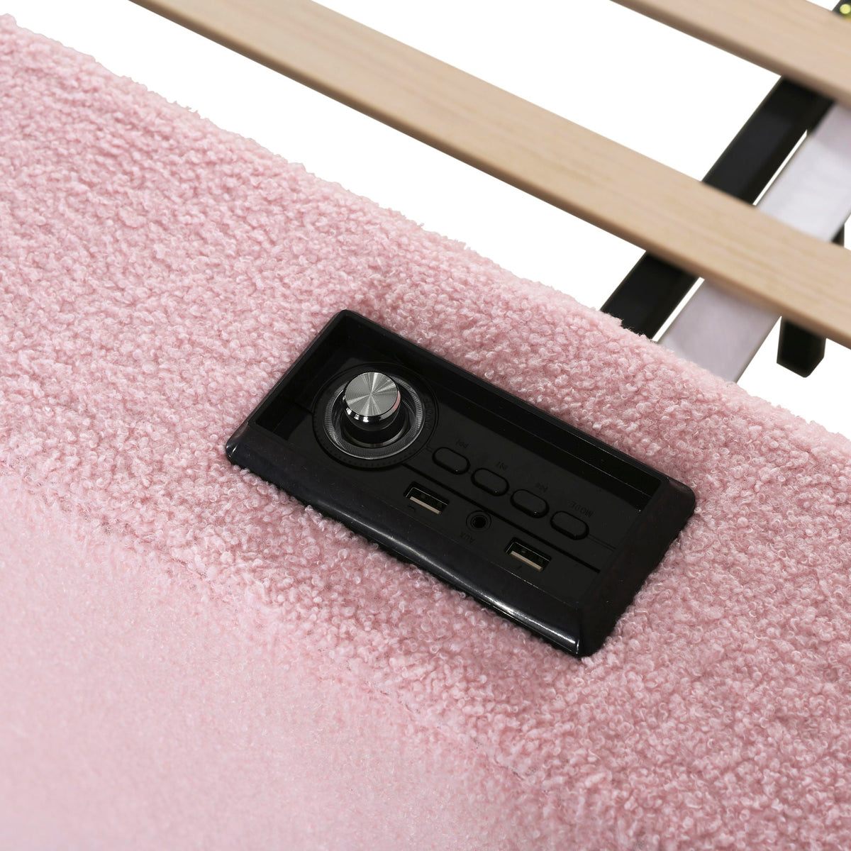 Trundle bed frame with light wood slats and built-in audio panel on pink shag rug on Tampa Home & Garden Store