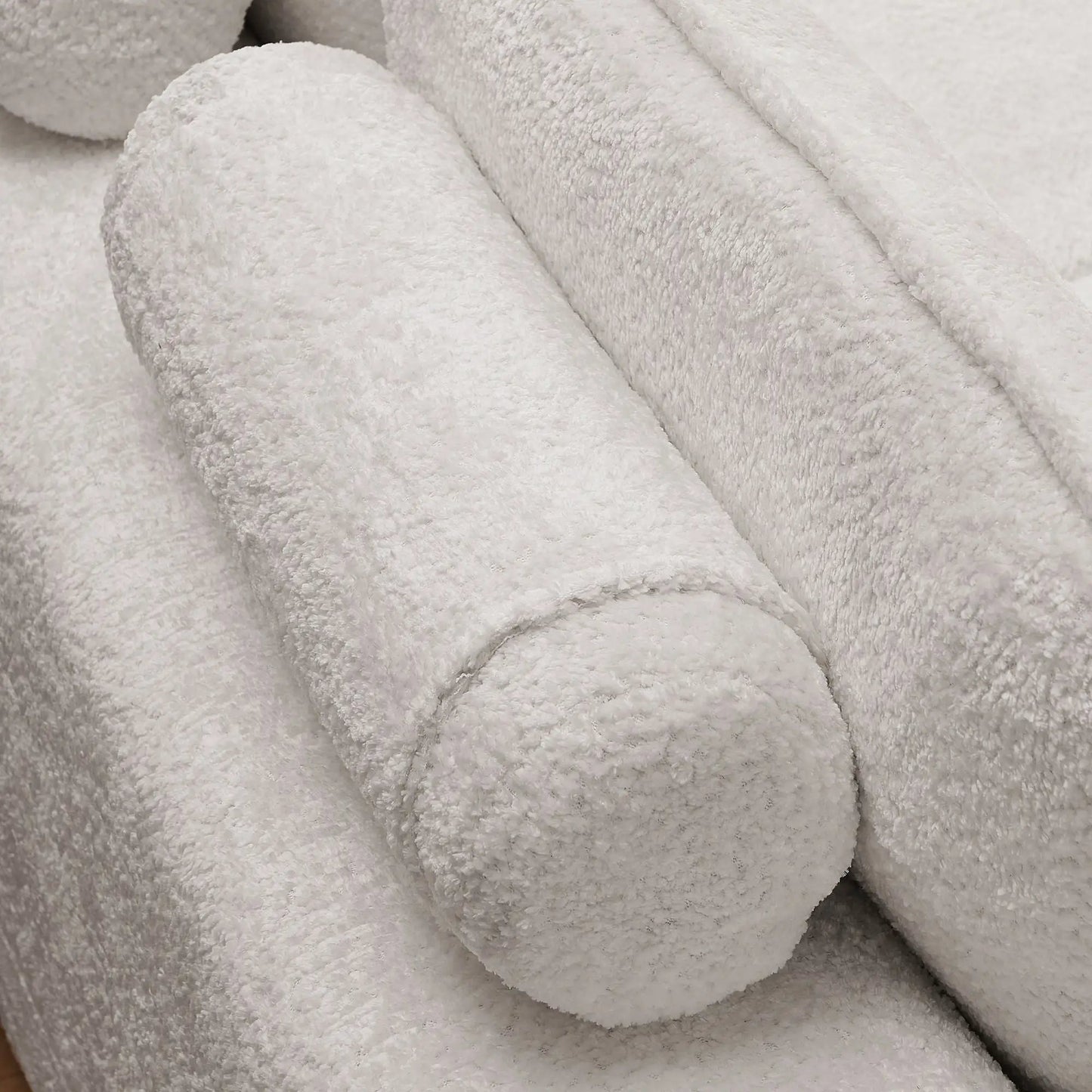 Sectional sofa fabric close-up in light gray plush upholstery with soft texture on Tampa Home & Garden Store