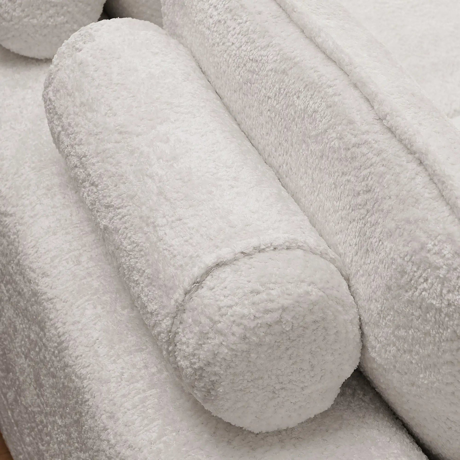 Sectional sofa fabric close-up in light gray plush upholstery with soft texture on Tampa Home & Garden Store