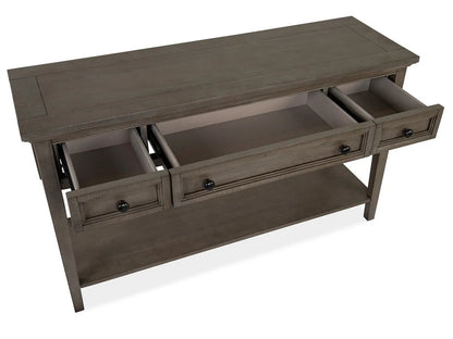 Paxton Place rectangular sofa table in dovetail gray with three drawers and lower shelf on Tampa Home & Garden Store