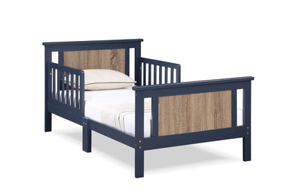 Connelly reversible panel toddler bed in navy blue with natural wood panels on Tampa Home & Garden Store