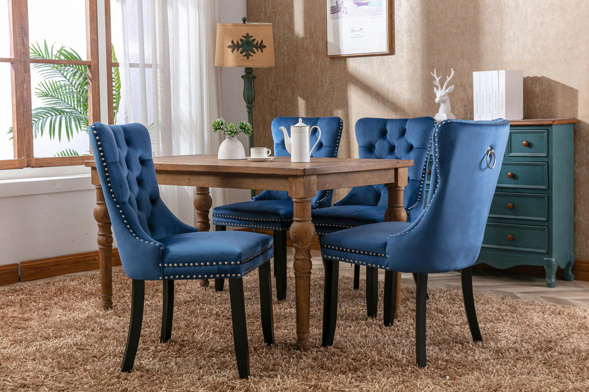 Blue velvet tufted dining chair set with nailhead trim around a table, 4 chairs HouseOfZazla on Tampa Home & Garden Store