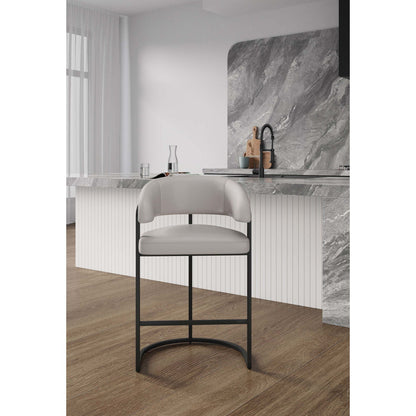 Augusta Counter Stool by HouseOfZazla, cream upholstered seat with black metal legs on Tampa Home & Garden Store