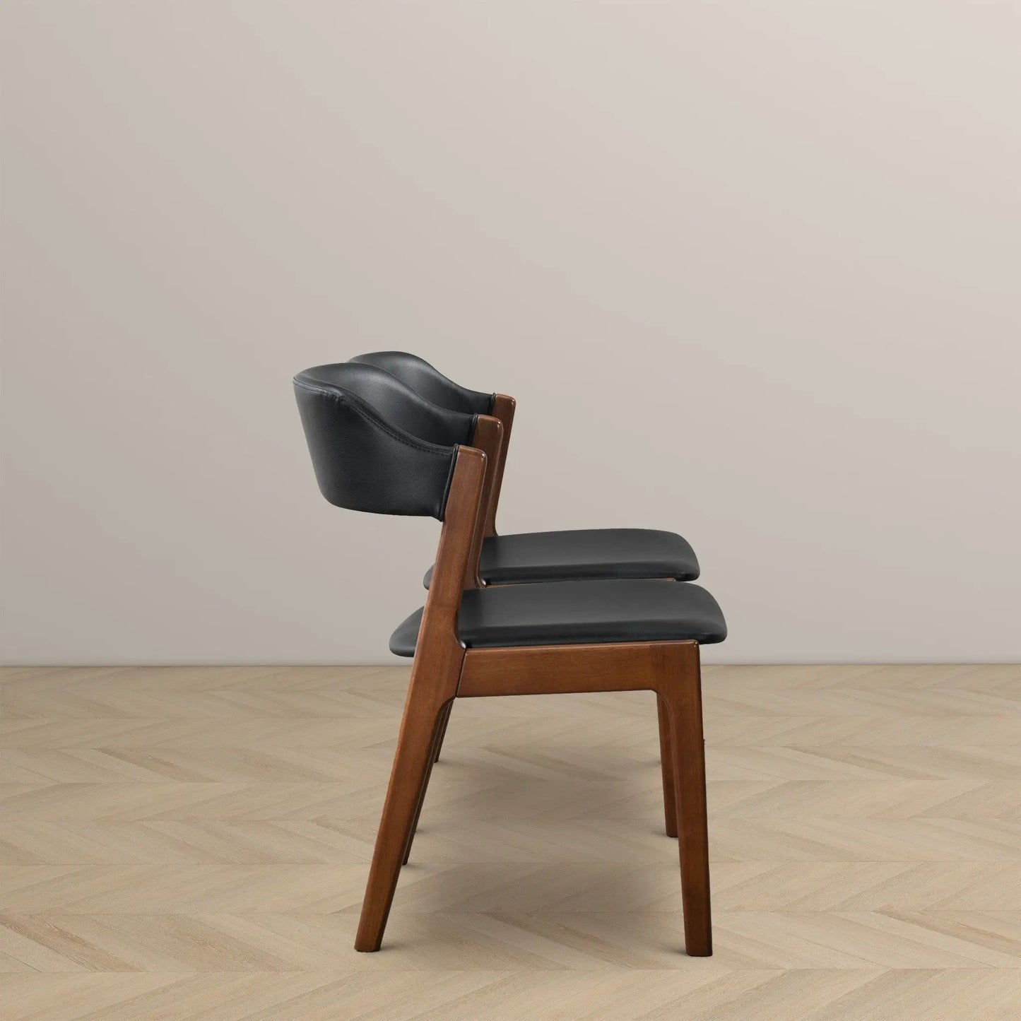 Enzo dining chair set of 2, black leather upholstery on brown wood frame on Tampa Home & Garden Store