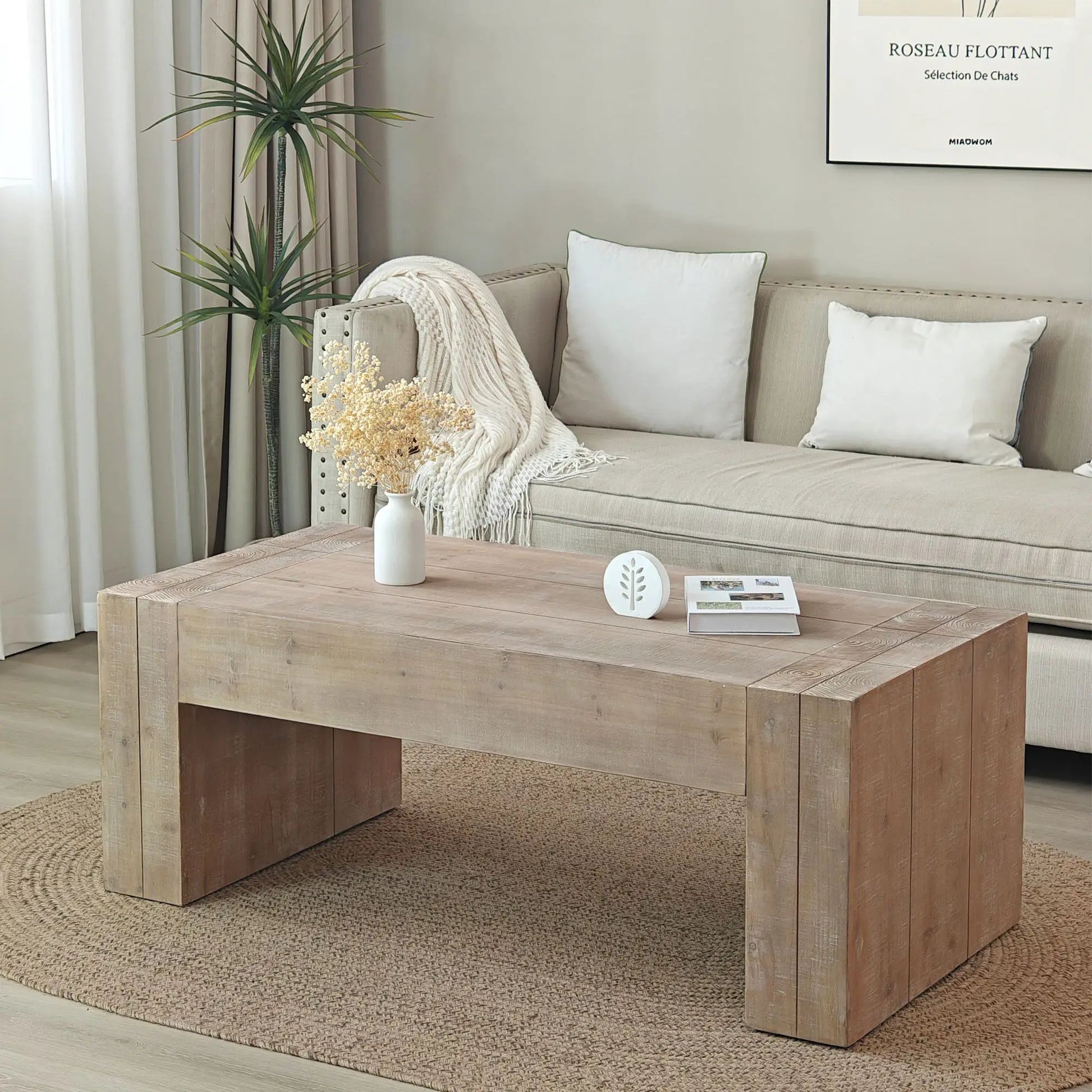 Minimalist rectangular coffee table in natural wood with block legs in living room on Tampa Home & Garden Store