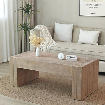 Minimalist rectangular coffee table in natural wood with block legs in living room on Tampa Home & Garden Store