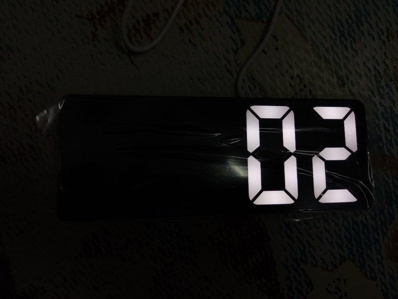Acrylic mirror LED alarm clock with oversized white digits on a black rectangular housing on Tampa Home & Garden Store