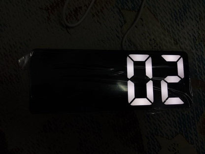 Acrylic mirror LED alarm clock with oversized white digits on a black rectangular housing on Tampa Home & Garden Store