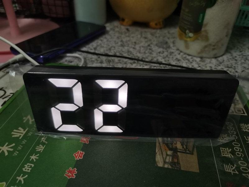 Acrylic mirror LED alarm clock with black glossy finish and large white digits for desk use on Tampa Home & Garden Store