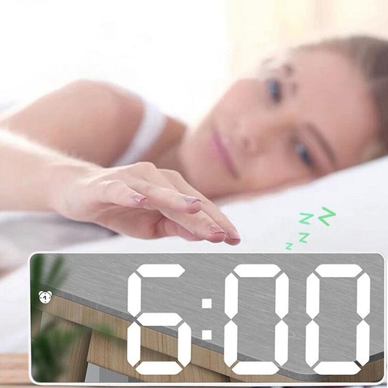 Stevvex acrylic mirror LED alarm clock with large white digits on a bedroom nightstand on Tampa Home & Garden Store