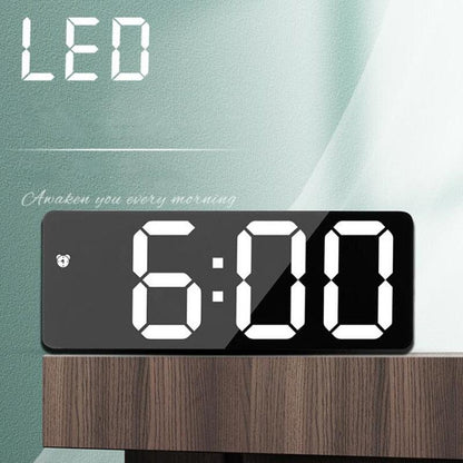 Stevvex LED digital alarm clock with black acrylic mirror face and large white digits on Tampa Home & Garden Store