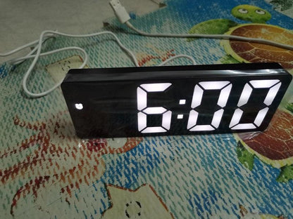 Stevvex acrylic/mirror LED desk clock with 6:00 display, black case and USB cord on a rug on Tampa Home & Garden Store