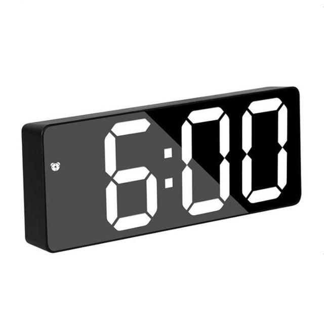 Acrylic mirrored LED digital alarm clock with oversized 6:00 display and black frame on Tampa Home & Garden Store