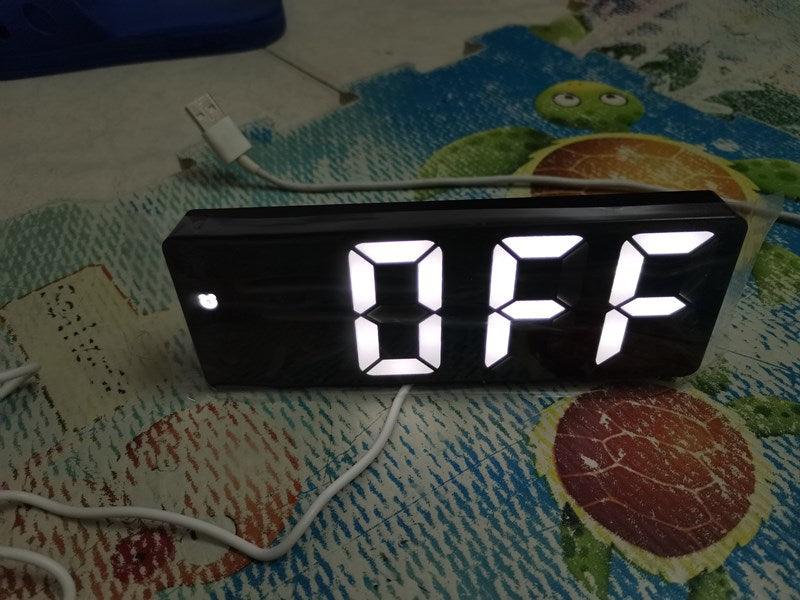Stevvex acrylic mirror LED digital alarm clock with large white digits on bedside table on Tampa Home & Garden Store