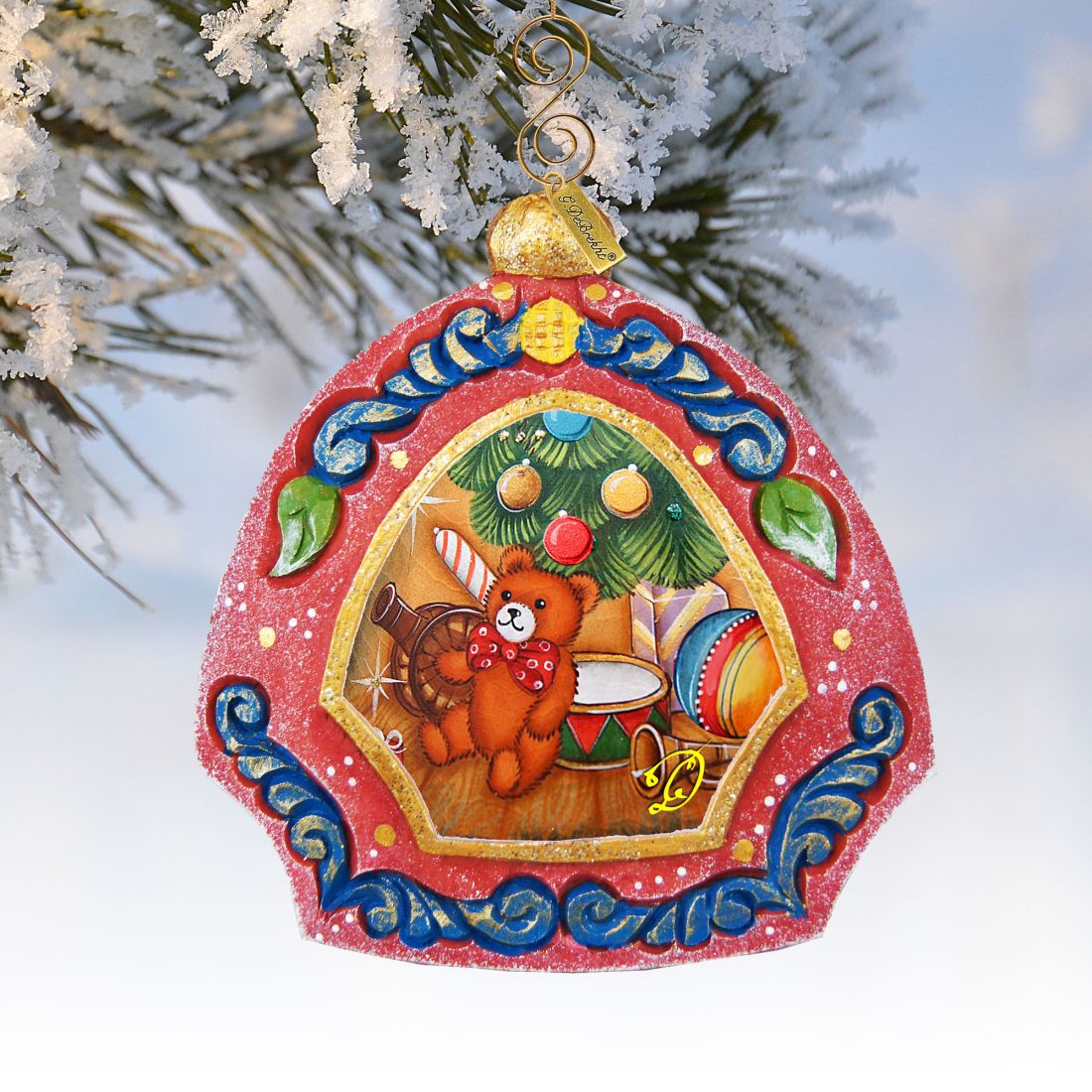 Teddy Bear Medallion Hand-Painted Ornament by G. DeBrekht with red frame and blue scrollwork on Tampa Home & Garden Store