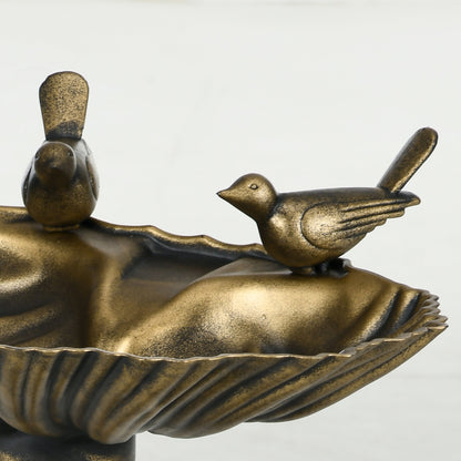 Antique bronze bird bath with perched birds on a decorative pedestal edge on Tampa Home & Garden Store