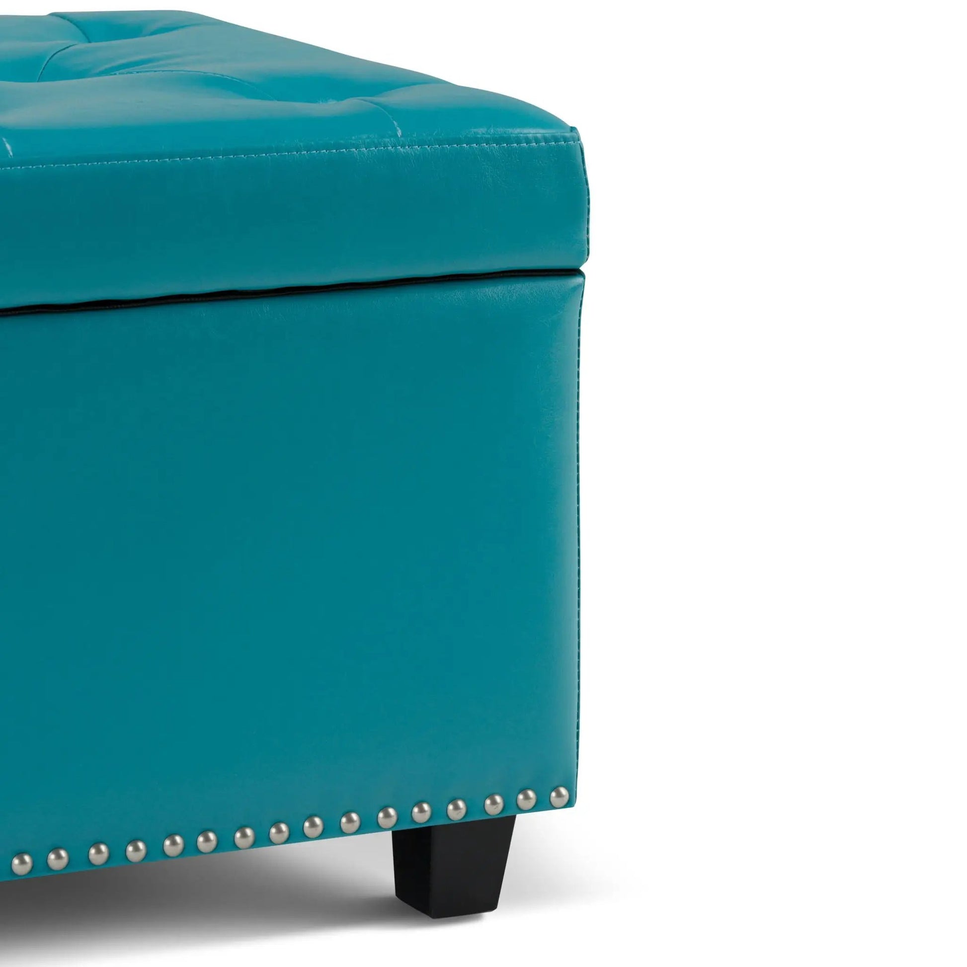 Hamilton Upholstered Storage Ottoman in teal with nailhead trim and black legs on Tampa Home & Garden Store