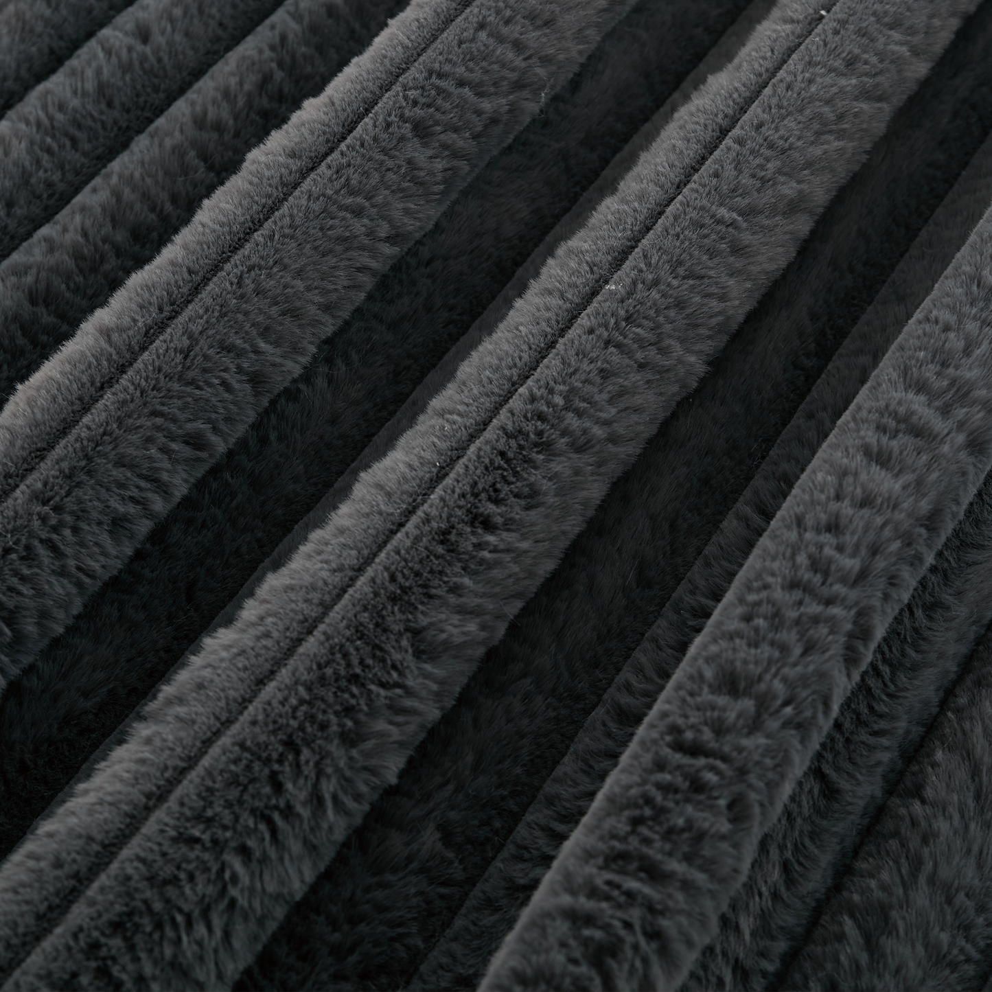 Oversized chaise lounge close-up in dark gray plush fur texture by HouseOfZazla on Tampa Home & Garden Store