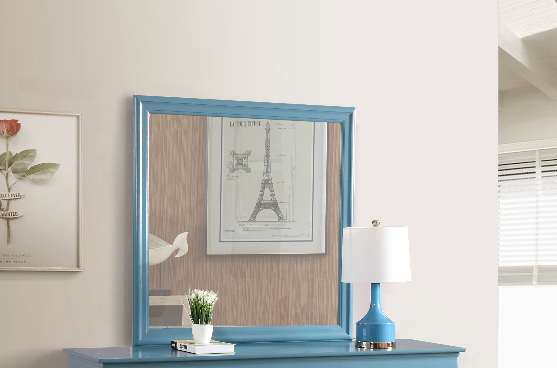 Traditional blue-framed wall mirror by Unique Piece Furniture above a blue console on Tampa Home & Garden Store