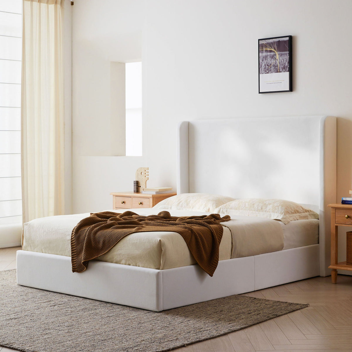 Carmen King Size Upholstered Wingback Bed in white with beige bedding and brown throw on Tampa Home & Garden Store