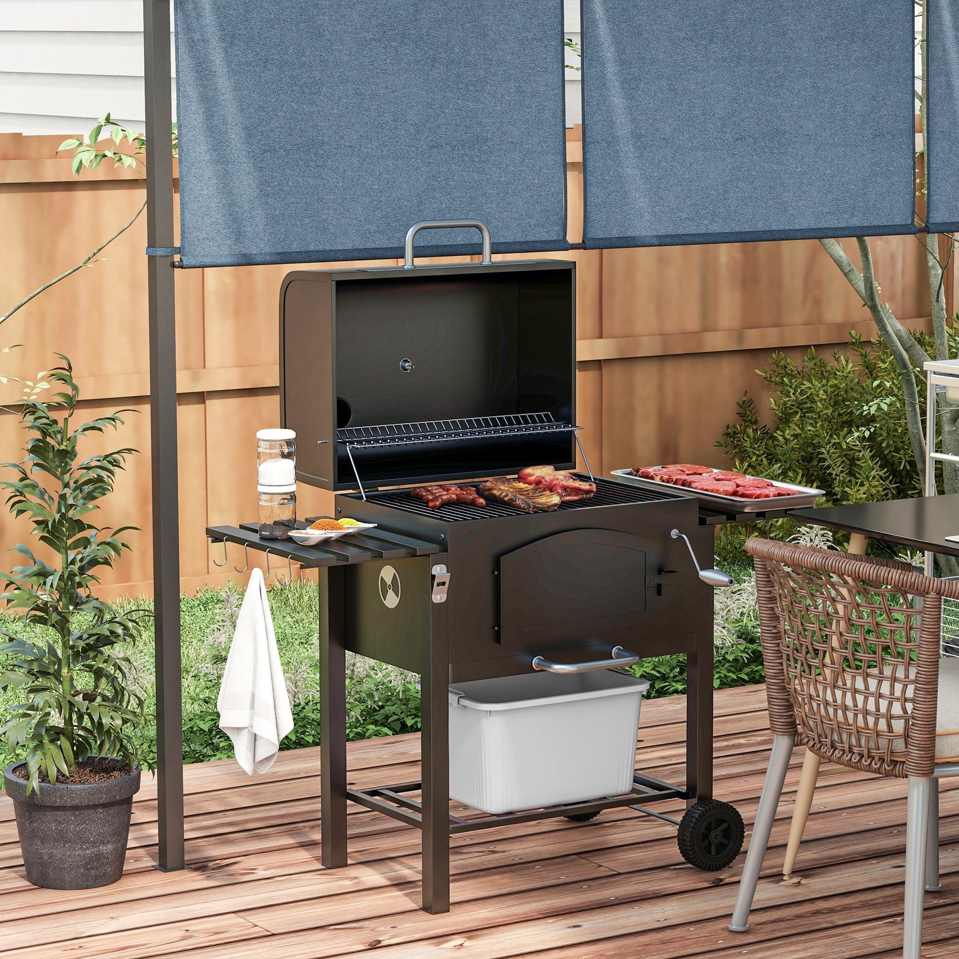 Outsunny charcoal grill with adjustable height and folding shelves, black steel unit on Tampa Home & Garden Store