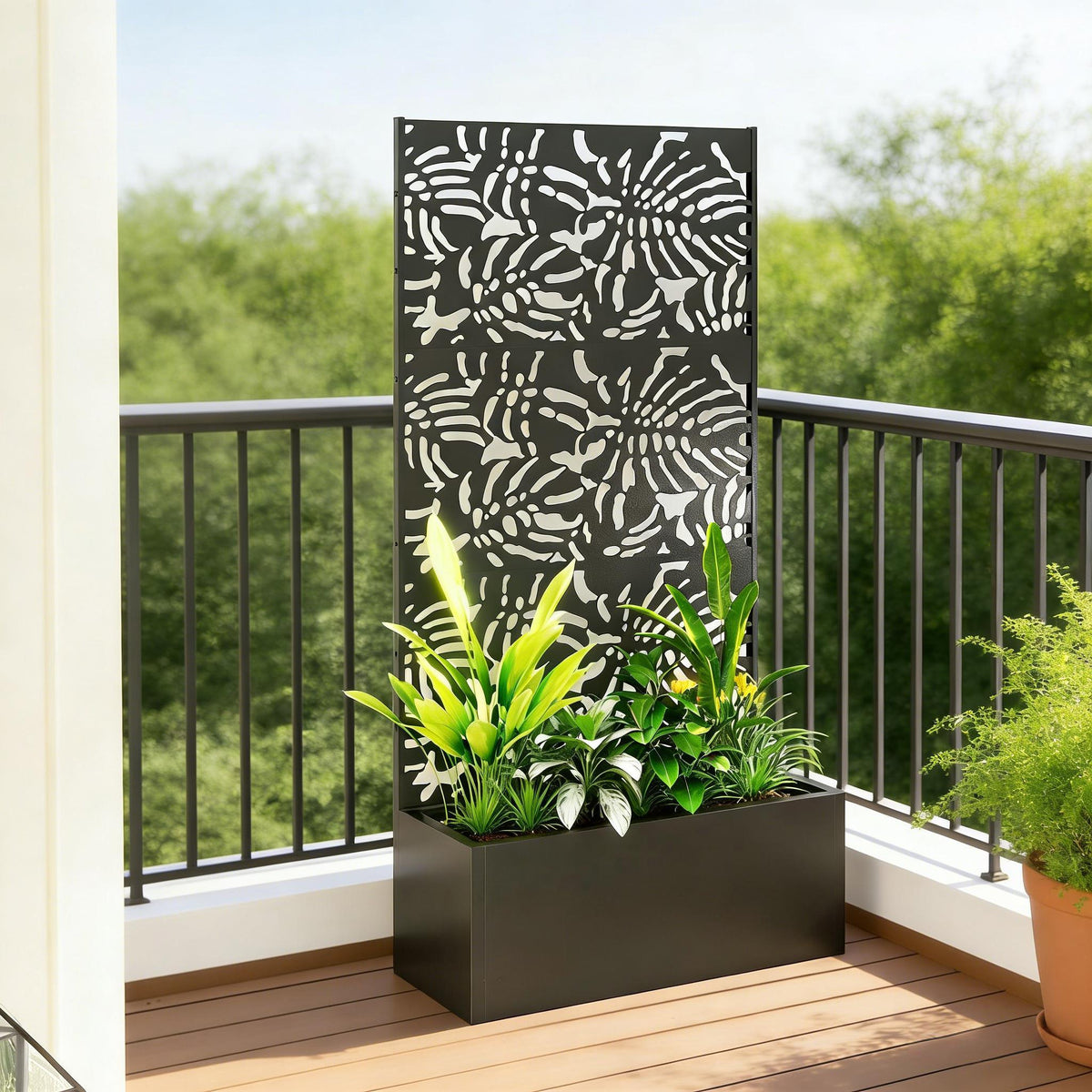 HouseOfZazla Trellis Planter black metal box with decorative white cutout panel and drainage, lush greenery on Tampa Home & Garden Store
