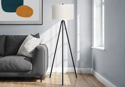 Floor lamp Contemporary by HouseOfZazla with black tripod legs and white fabric shade on Tampa Home & Garden Store