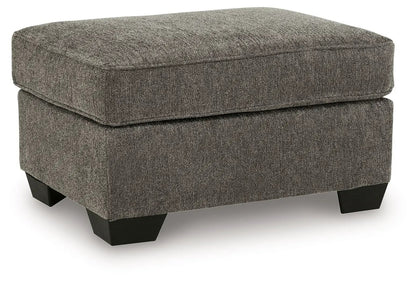 Ottoman from Olten Living Room Set in heather gray textured fabric with dark wood legs on Tampa Home & Garden Store