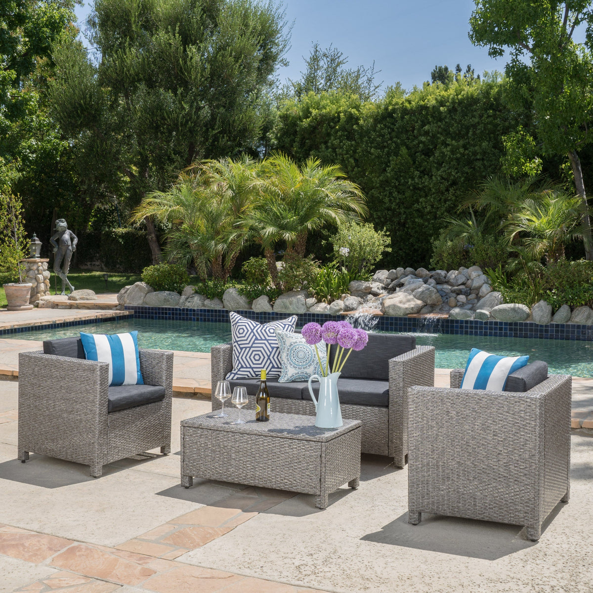 Puerta 4-Piece Outdoor Furniture Set gray wicker seating with blue striped cushions on Tampa Home & Garden Store