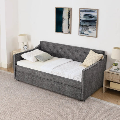 Daybed with pop up trundle and USB charging armrest in gray tufted fabric, white bedding on Tampa Home & Garden Store