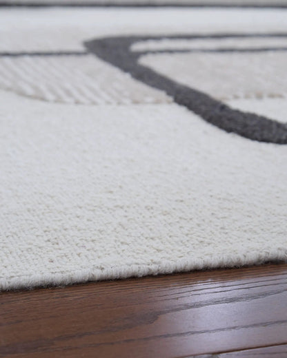 Davismour Rug, cream textured rug by Unique Piece Furniture with dark gray curved stripe on Tampa Home & Garden Store