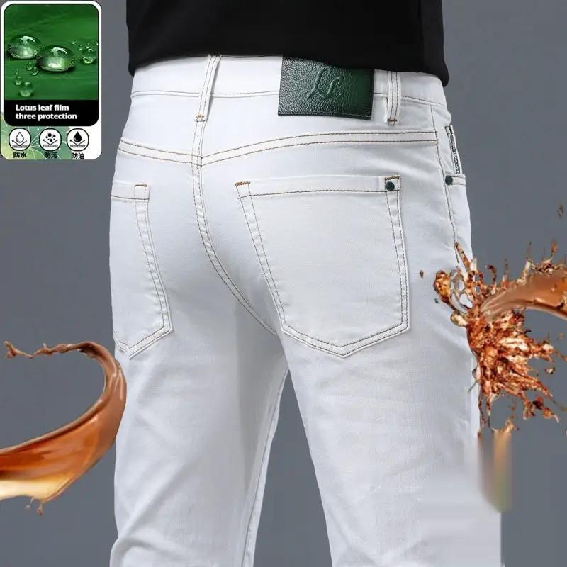 Xintang Nostalgic Washed Jeans by FLIPSTYLEZLLC, denim with green logo patch and back pockets on Tampa Home & Garden Store