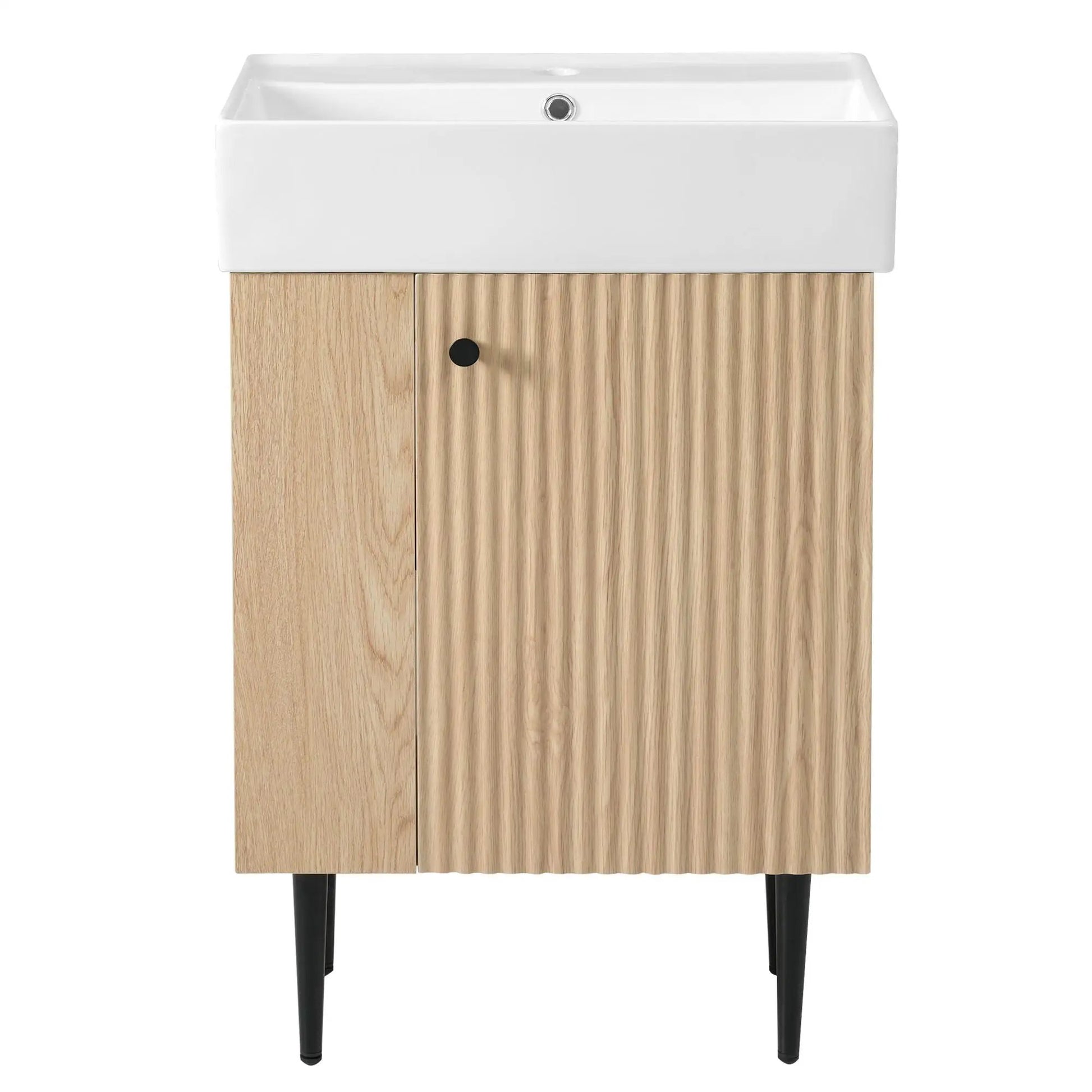 Bathroom vanity with white ceramic sink atop wood cabinet and black legs Unique Piece Furniture on Tampa Home & Garden Store