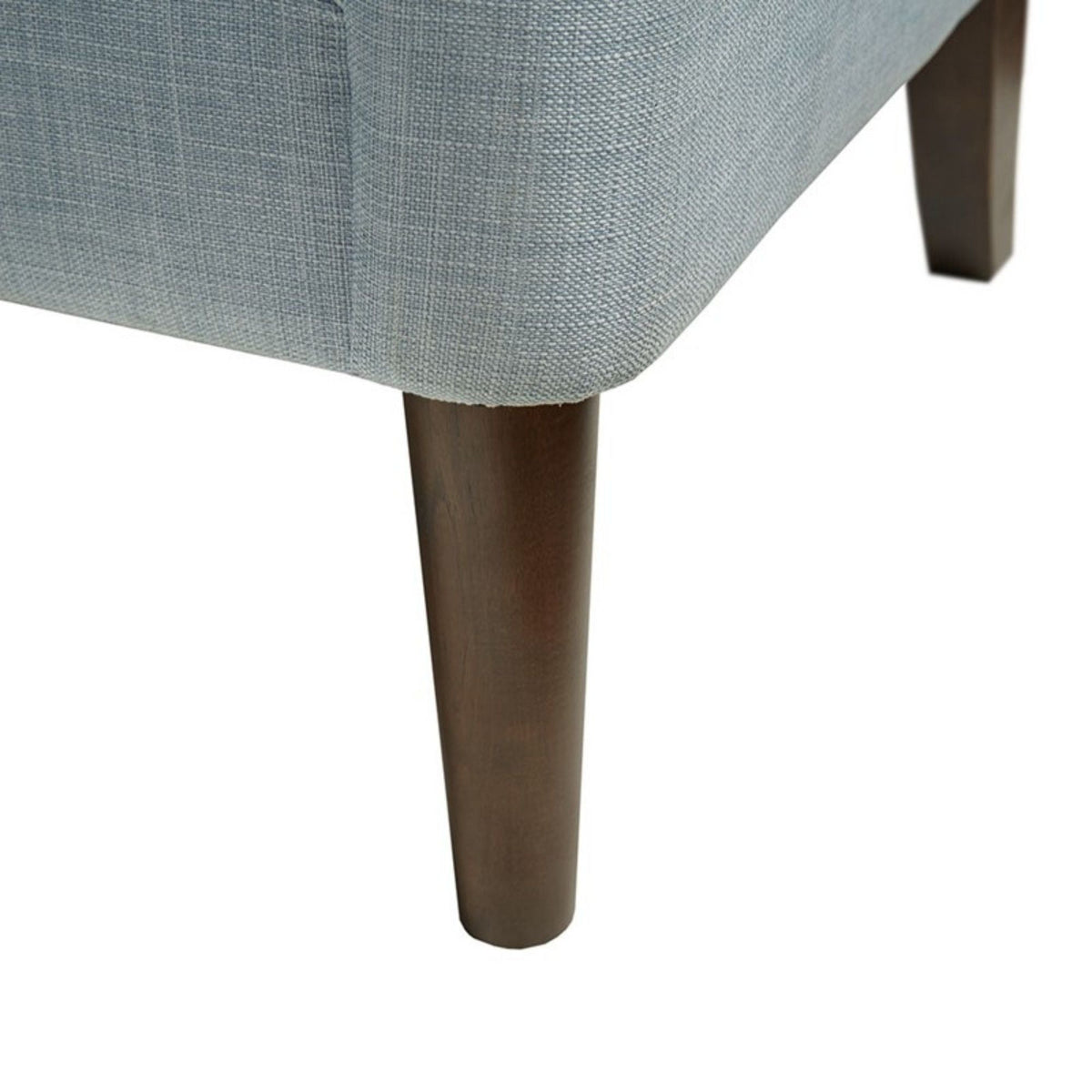 Armchair with light blue upholstery and dark wood tapered leg on Tampa Home & Garden Store