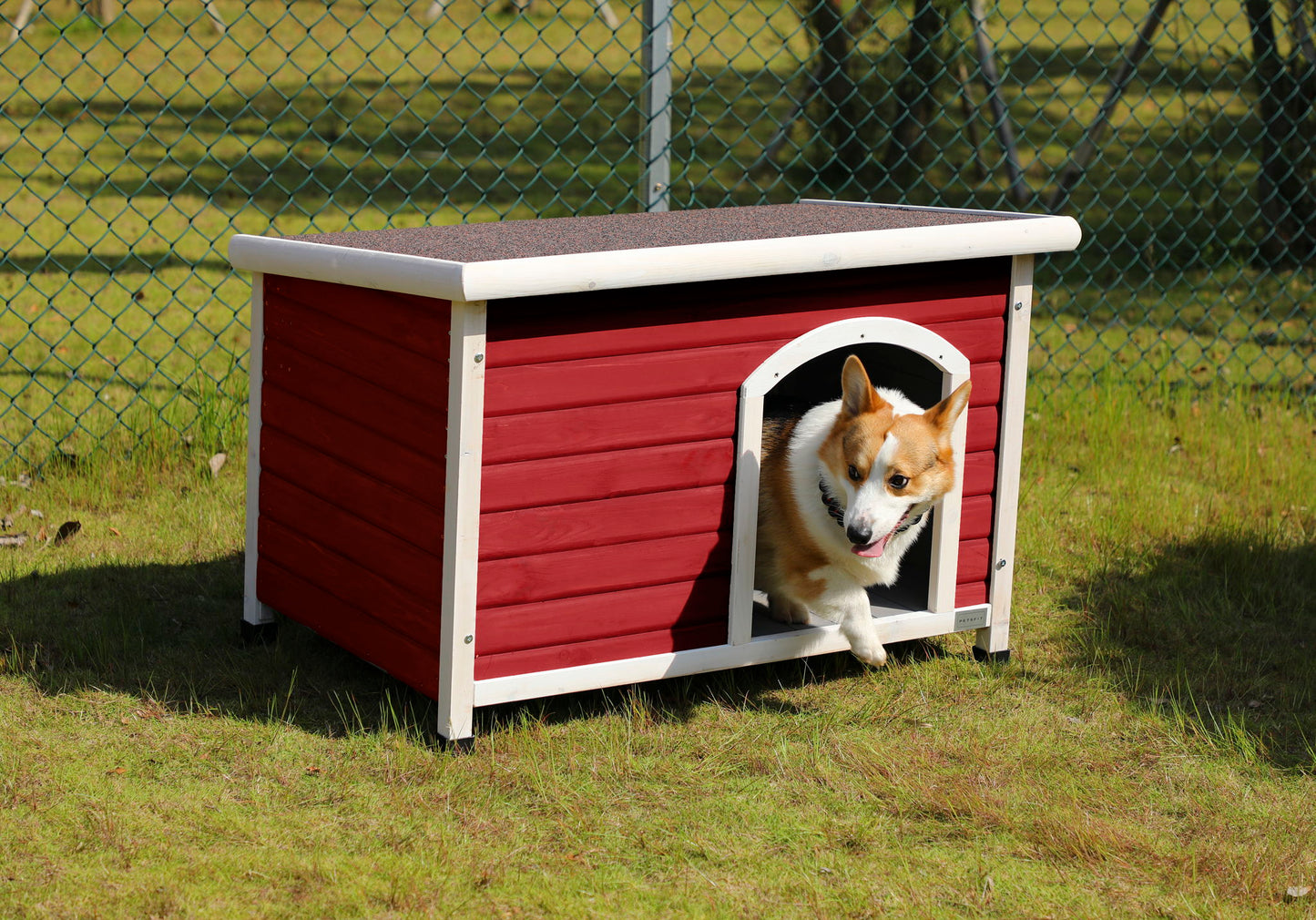 Medium red wooden dog house with white trim, waterproof roof, elevated floor on Tampa Home & Garden Store