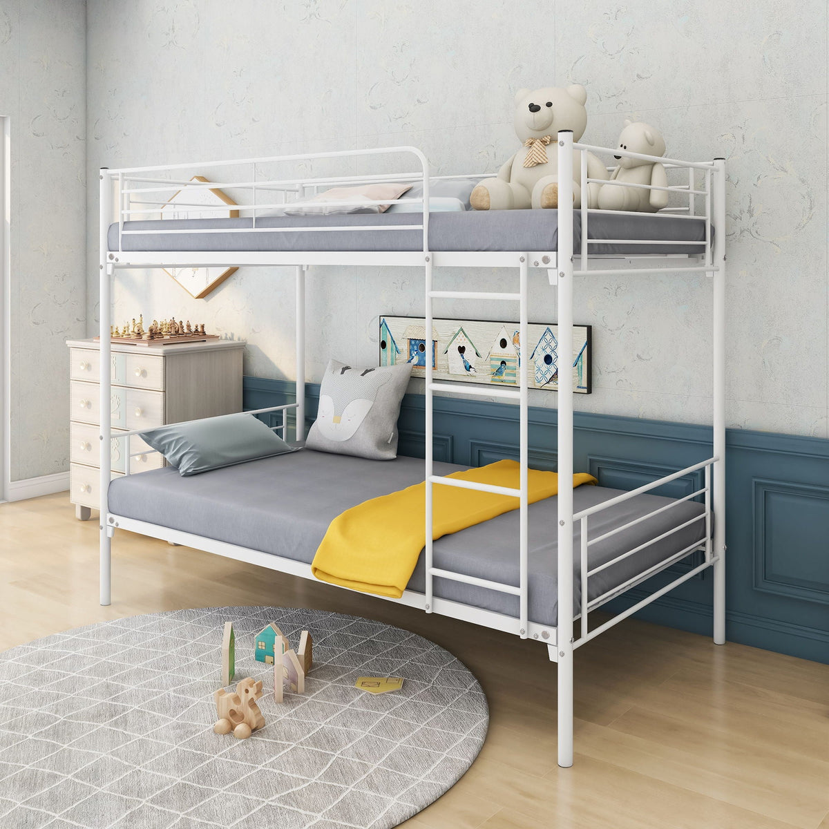 Twin over twin metal bunk bed with white frame and gray bedding, two teddy bears on the top bunk on Tampa Home & Garden Store