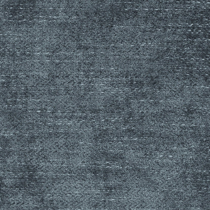 Close-up of dark gray textured carpet fibers for indoor flooring on Tampa Home & Garden Store