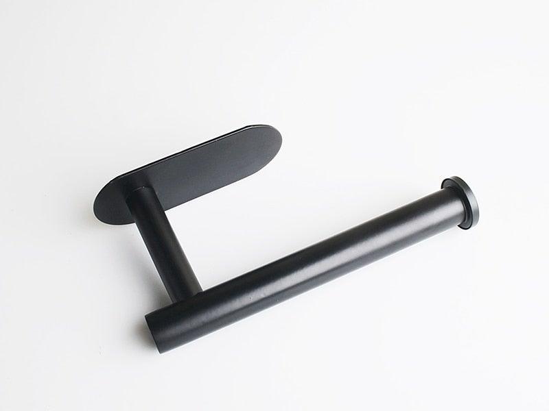 Stevvex black stainless steel adhesive toilet paper holder with horizontal front bar on Tampa Home & Garden Store