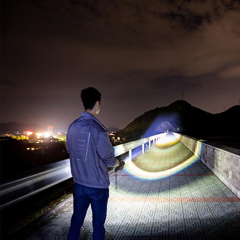 Adjustable rechargeable tactical flashlight with zoomable beam on night bridge path on Tampa Home & Garden Store